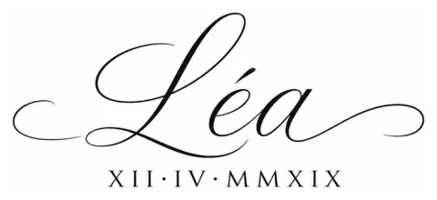 The first name "Léa" followed by the date XII·IV·MMXIX in Roman numerals, thin script, for the inner wrist